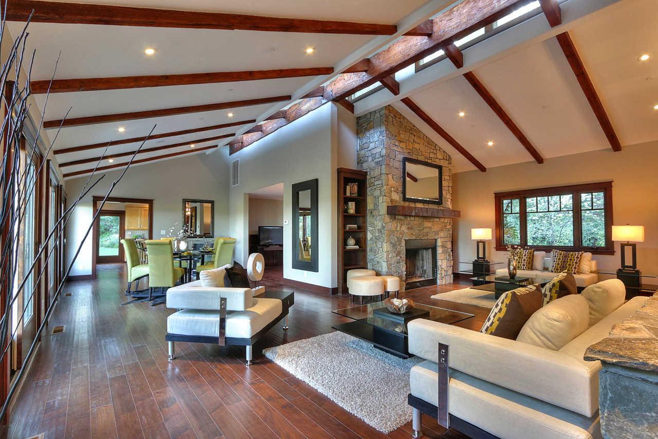 33 Montecito Road Woodside, CA 94062 - Photo 32 of 70 a living room with furniture and a fireplace