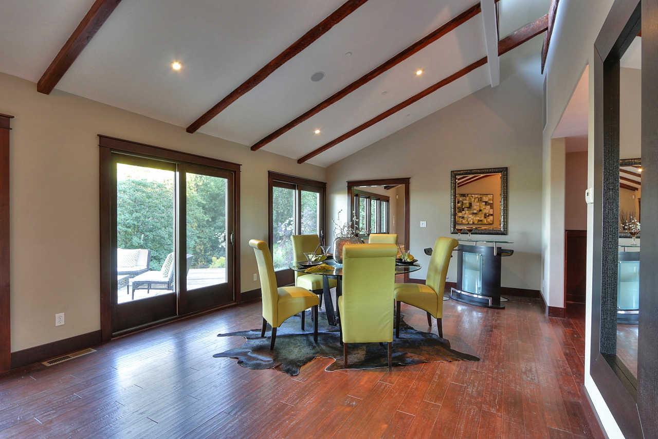 33 Montecito Road Woodside, CA 94062 - Photo 33 of 70 a living room with furniture and a floor to ceiling window