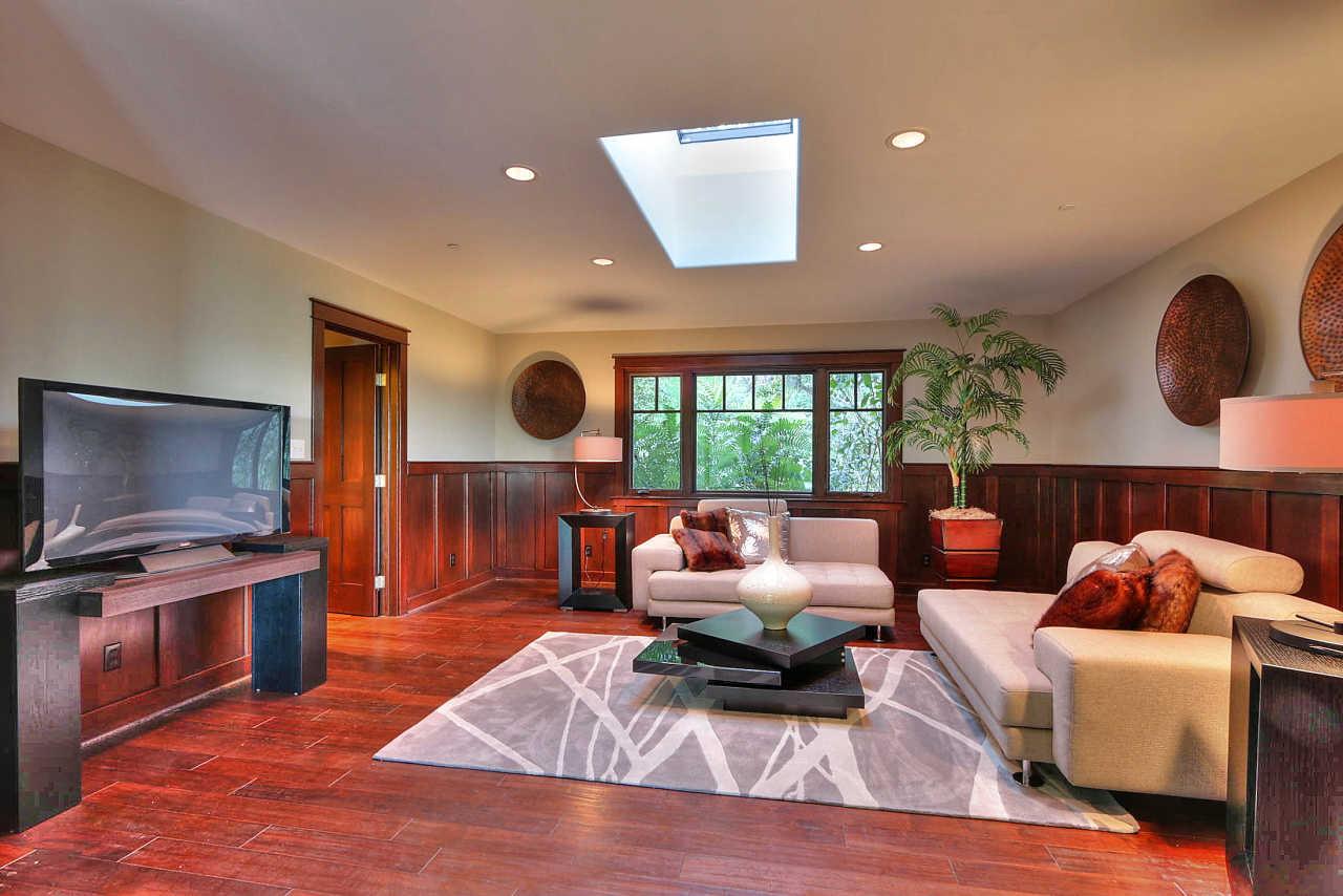 33 Montecito Road Woodside, CA 94062 - Photo 35 of 70 a living room with furniture and a flat screen tv