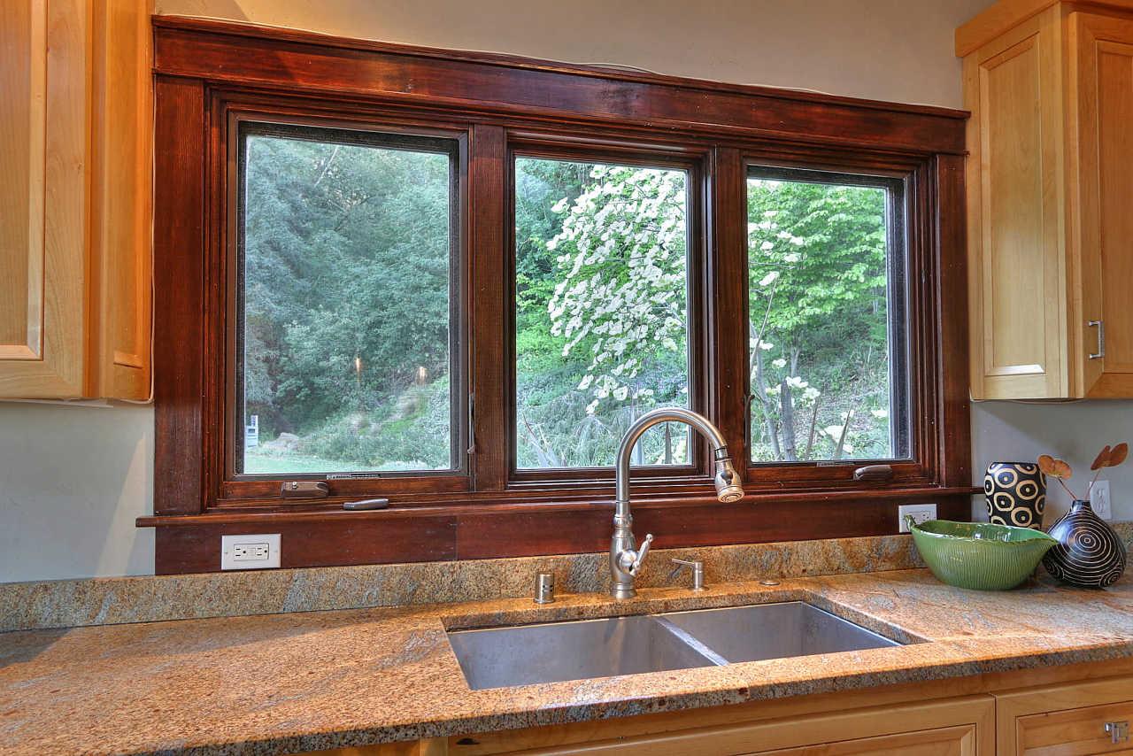 33 Montecito Road Woodside, CA 94062 - Photo 41 of 70 a kitchen with a sink and a large window