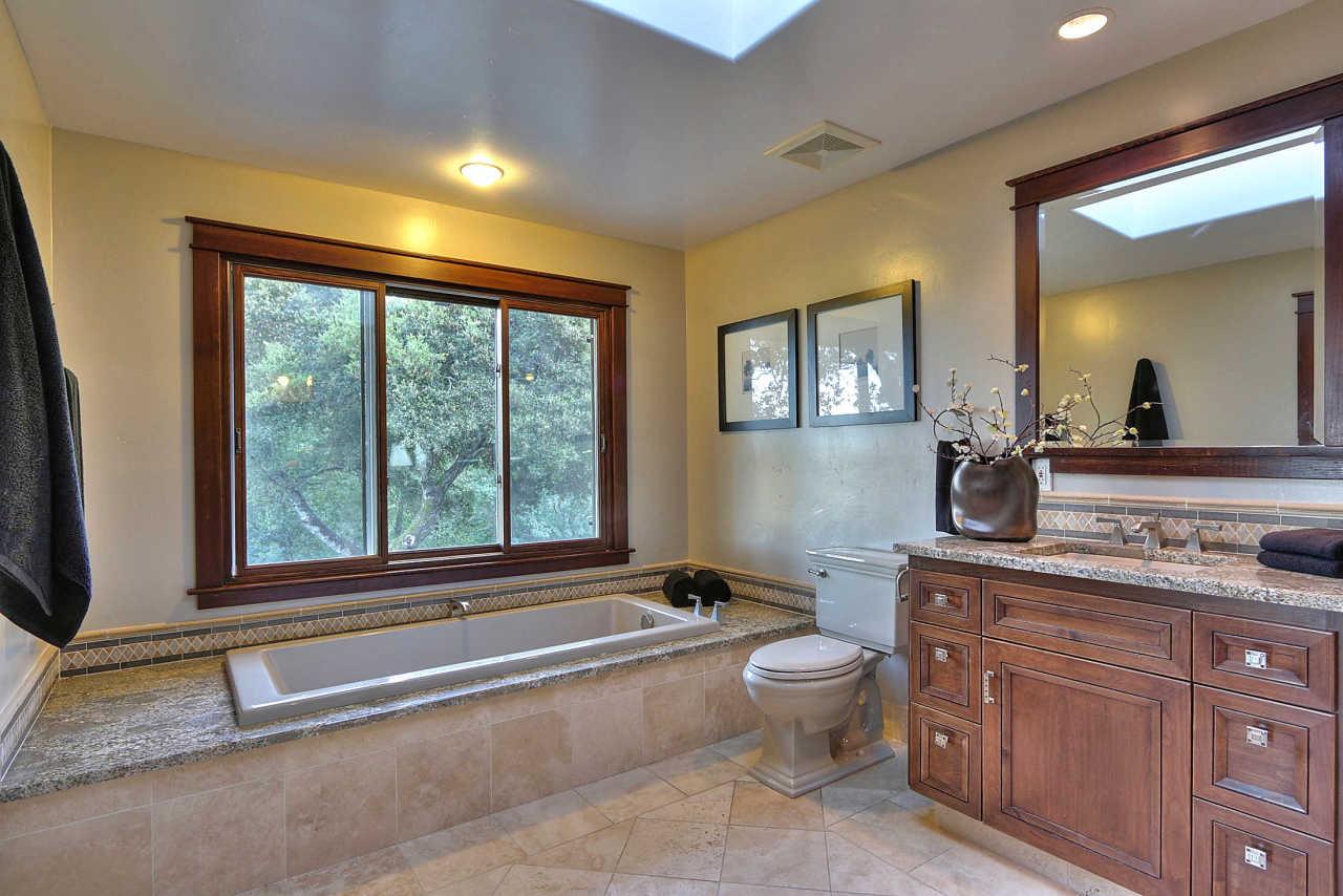 33 Montecito Road Woodside, CA 94062 - Photo 51 of 70 a spacious bathroom with a large tub and sink
