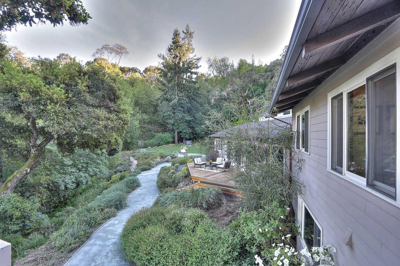 33 Montecito Road Woodside, CA 94062 - Photo 59 of 70 a view of backyard with plants and outdoor seating