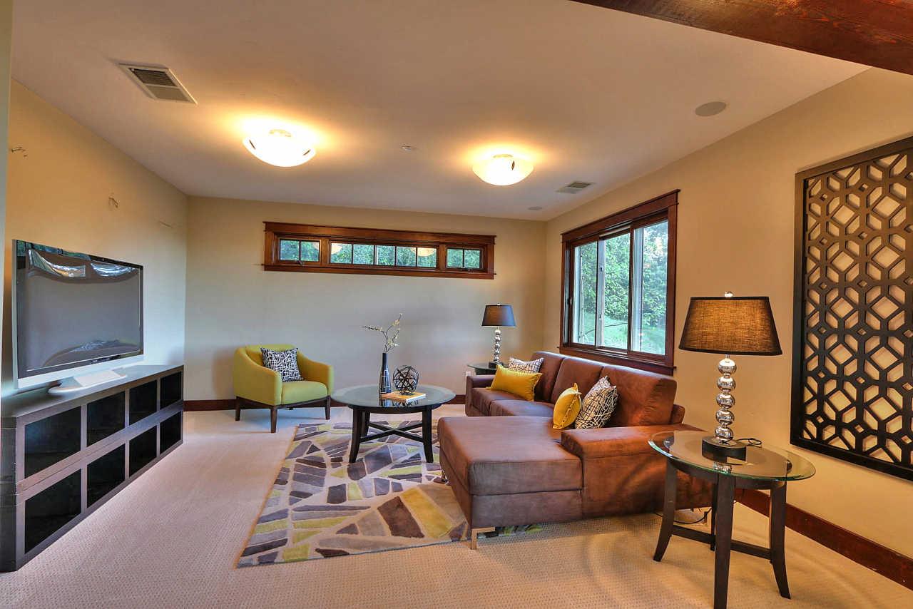 33 Montecito Road Woodside, CA 94062 - Photo 67 of 70 a living room with furniture and a flat screen tv