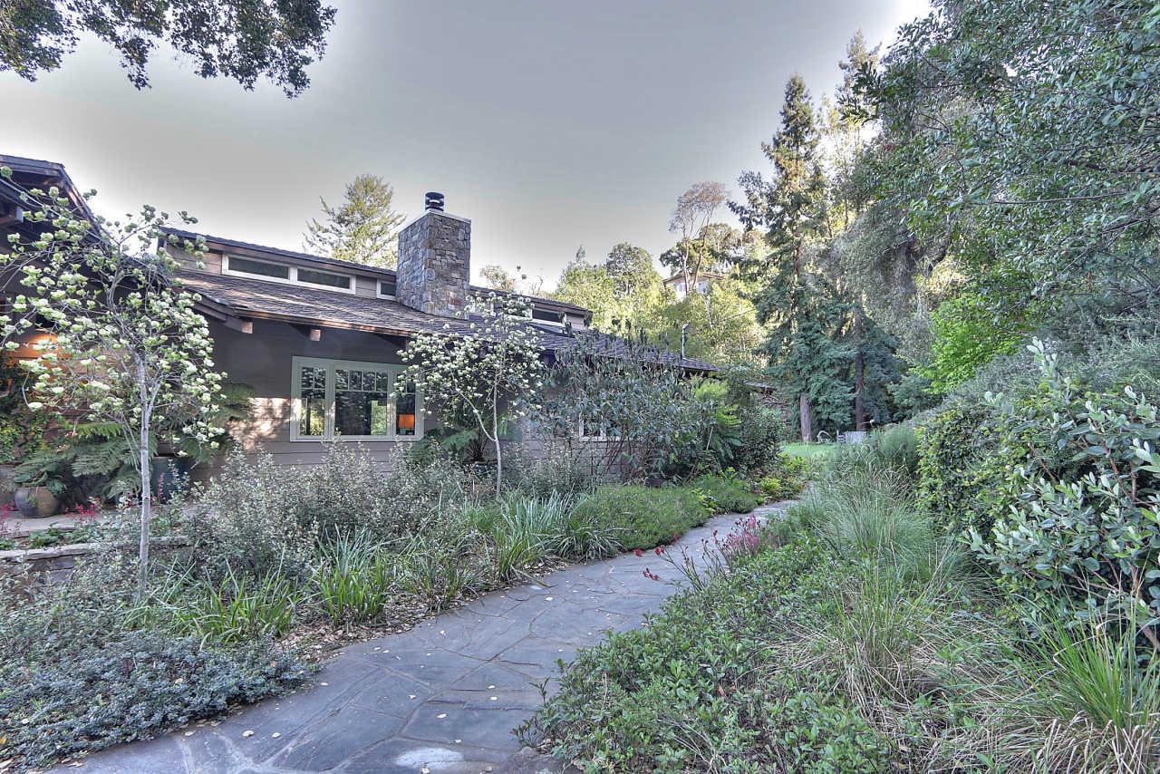 33 Montecito Road Woodside, CA 94062 - Photo 8 of 70 a view of a house with a yard and fountain in middle of the forest