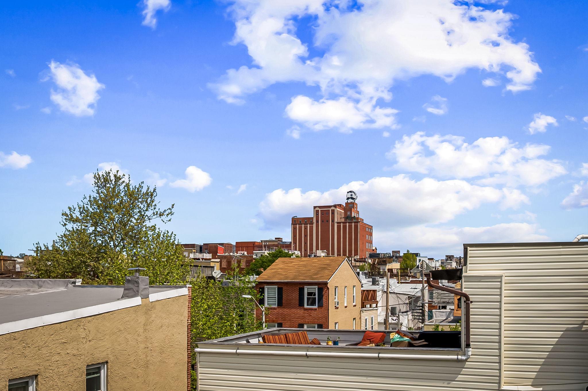 3134 Elliott Street Baltimore, MD 21224 - Photo 27 of 34 a view of a city from a terrace