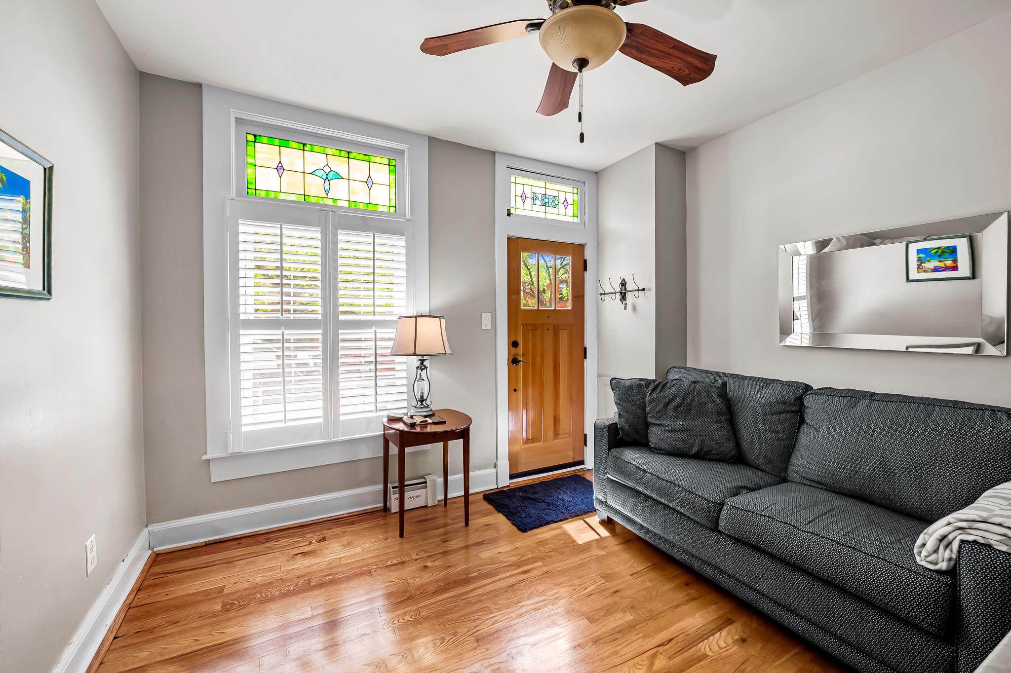 3134 Elliott Street Baltimore, MD 21224 - Photo 5 of 34 a living room with furniture and a window