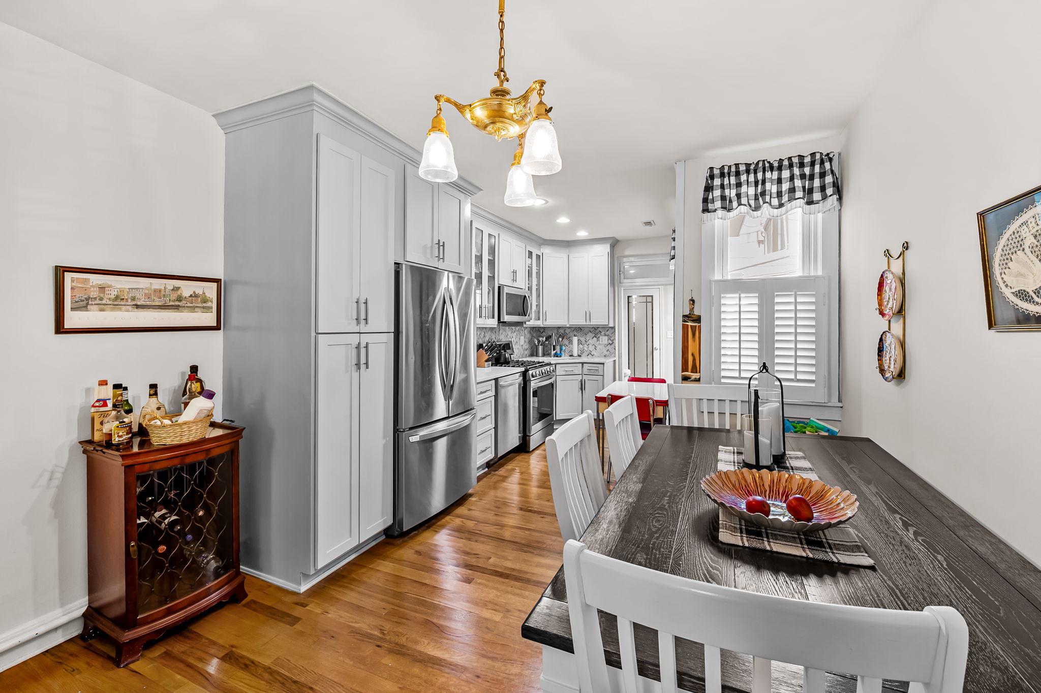 3134 Elliott Street Baltimore, MD 21224 - Photo 10 of 34 a living room with furniture and a table