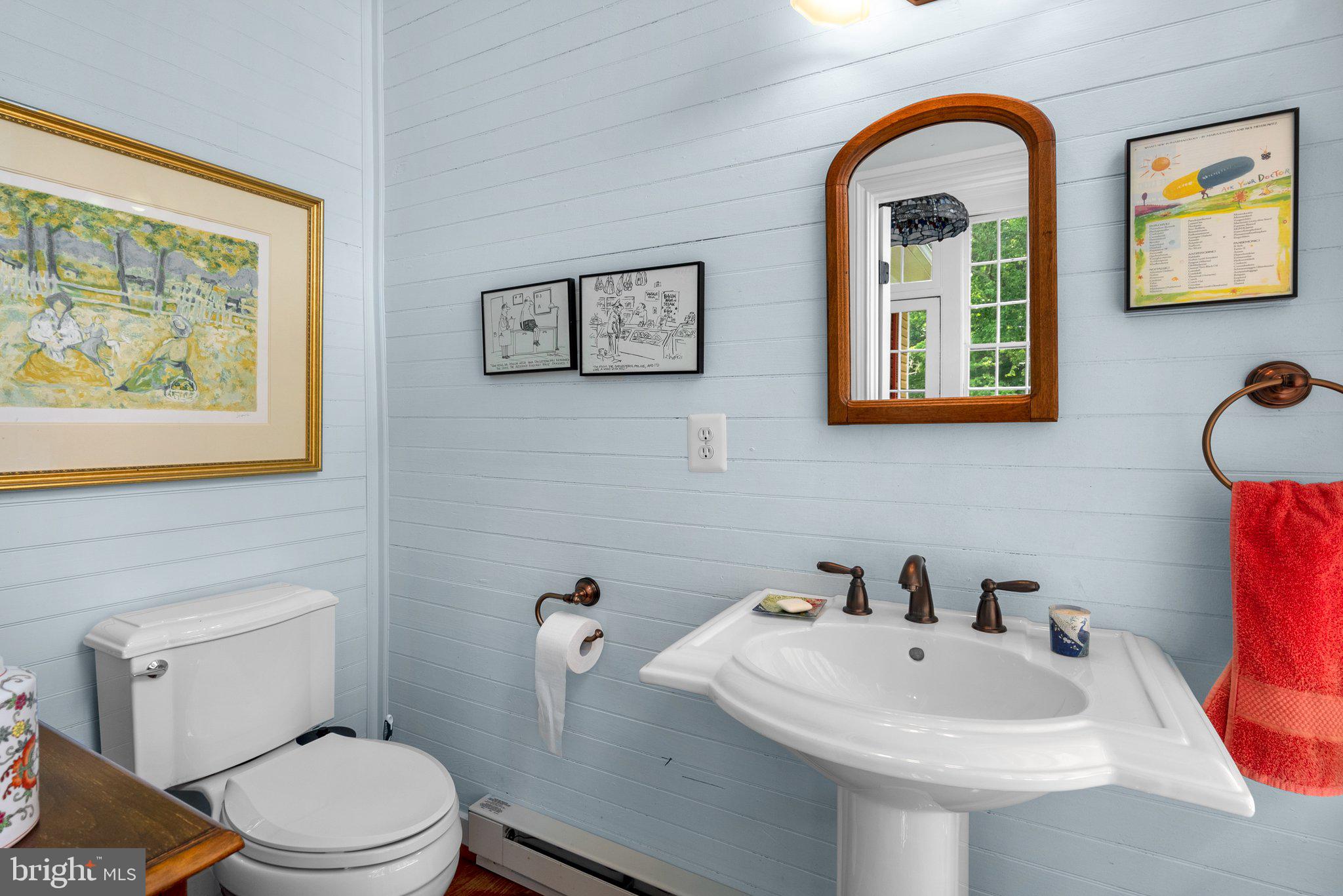 15407 Dr Bowen Road Aquasco, MD 20608 - Photo 27 of 89 a bathroom with a toilet sink and mirror