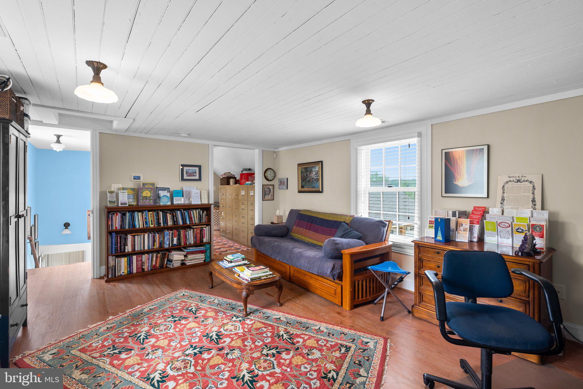 15407 Dr Bowen Road Aquasco, MD 20608 - Photo 40 of 89 a living room with furniture a rug and a window