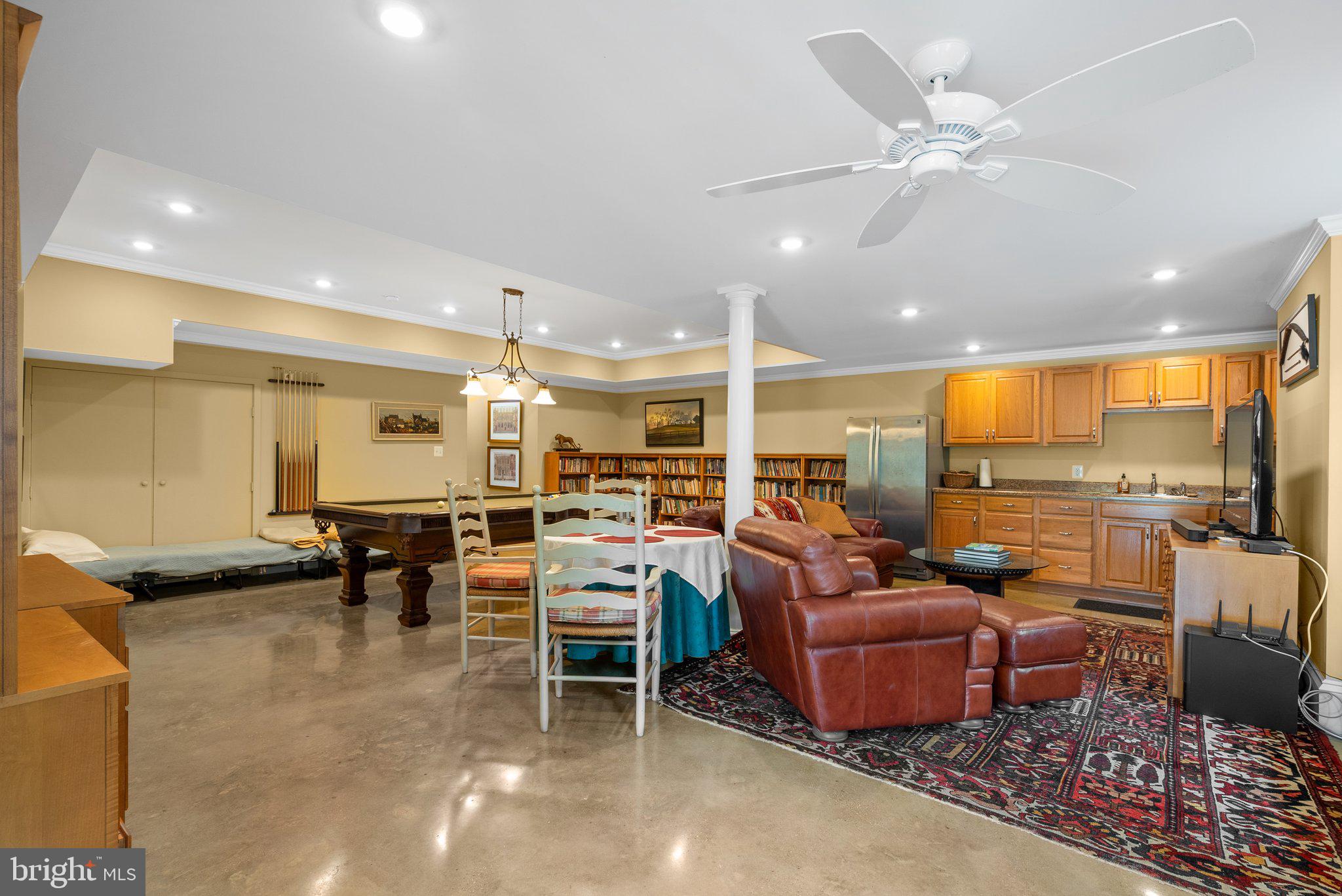 15407 Dr Bowen Road Aquasco, MD 20608 - Photo 49 of 89 a living room with lots of furniture and view of kitchen