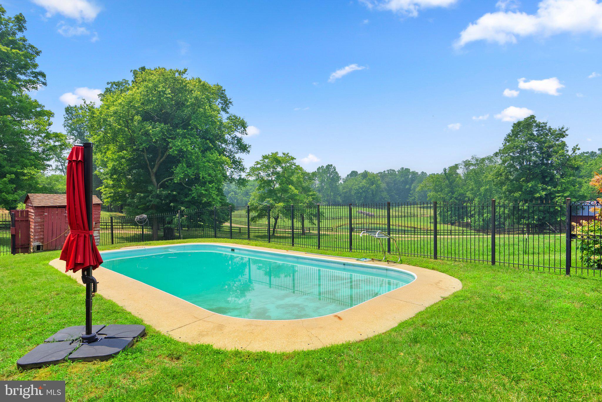 15407 Dr Bowen Road Aquasco, MD 20608 - Photo 54 of 89 a view of a backyard with swimming pool