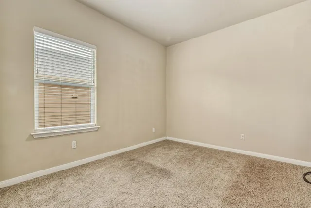 a kitchen with stainless steel appliances granite countertop a stove and a sink
