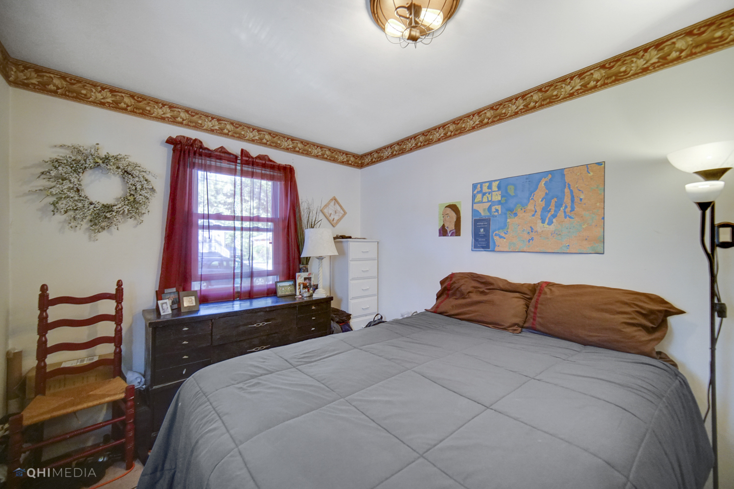 1231 Olive Road Homewood, IL 60430 - Photo 14 of 23 a bedroom with a bed and a painting on the wall