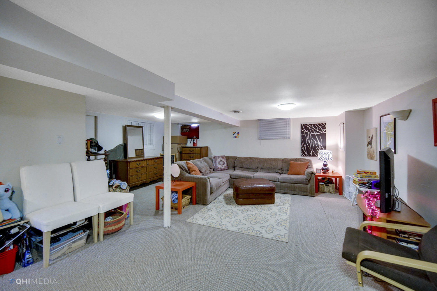 1231 Olive Road Homewood, IL 60430 - Photo 17 of 23 a living room with furniture and a flat screen tv