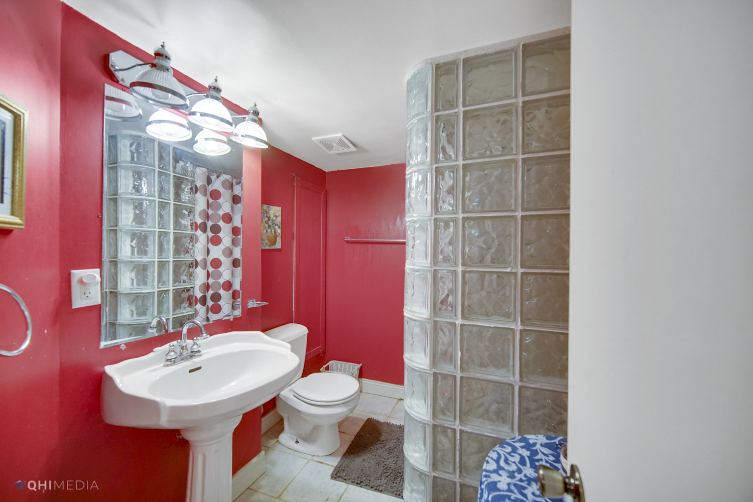 1231 Olive Road Homewood, IL 60430 - Photo 18 of 23 a bathroom with a sink toilet and shower