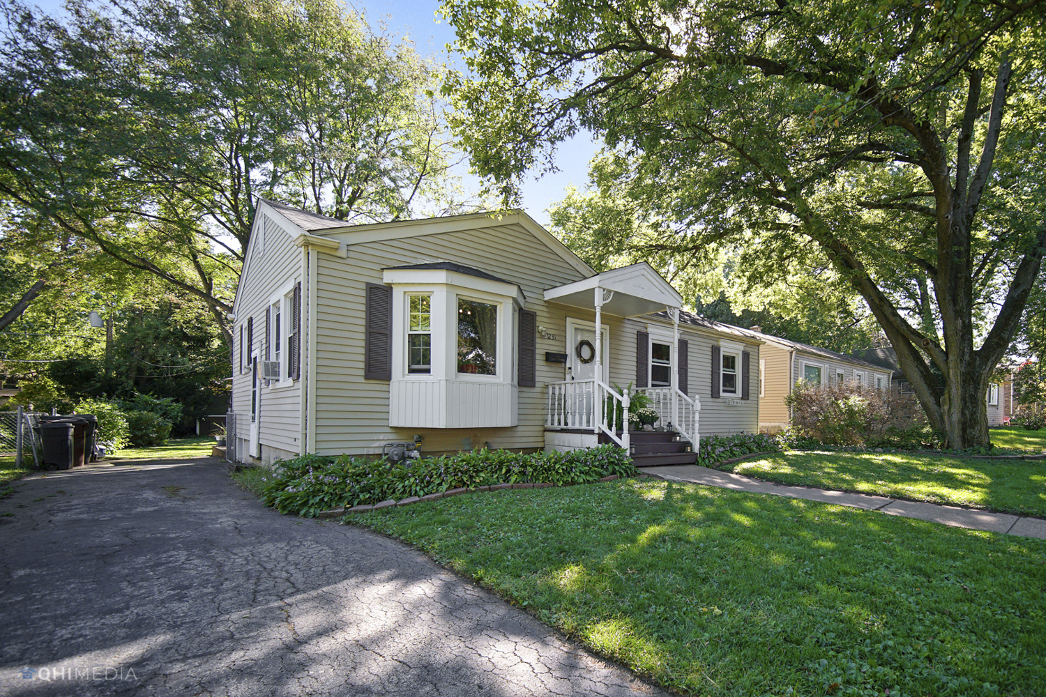 1231 Olive Road Homewood, IL 60430 - Photo 3 of 23 a front view of house with yard and green space