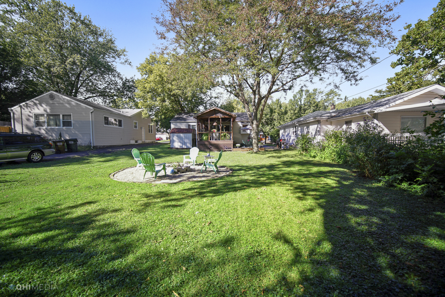 1231 Olive Road Homewood, IL 60430 - Photo 22 of 23 a view of a house with a big yard plants and large trees