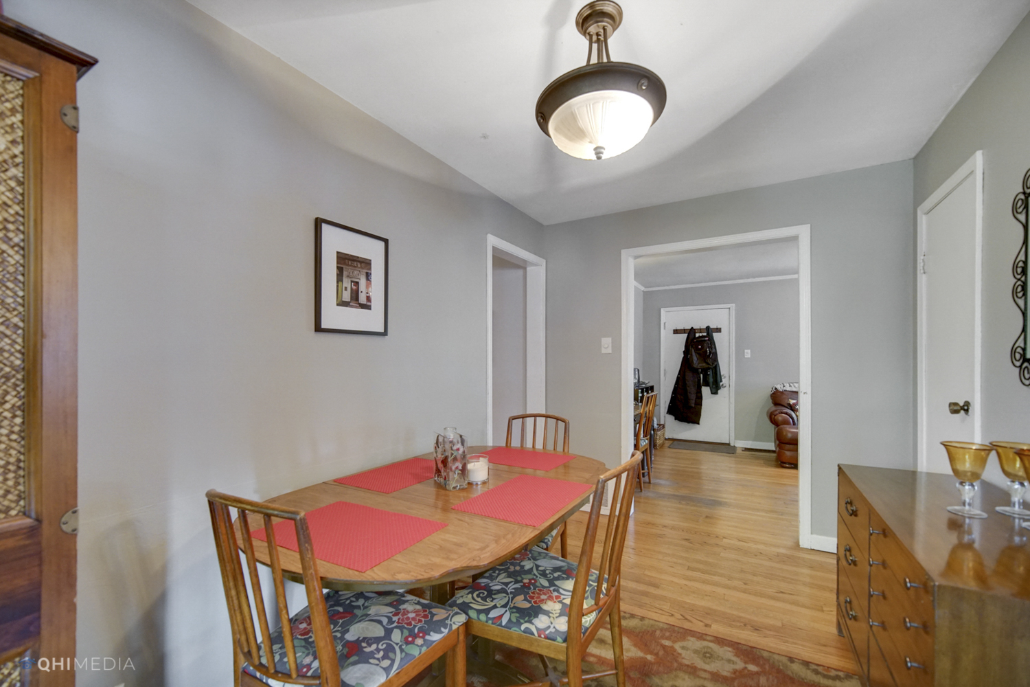1231 Olive Road Homewood, IL 60430 - Photo 7 of 23 a view of a dining room with furniture and wooden floor