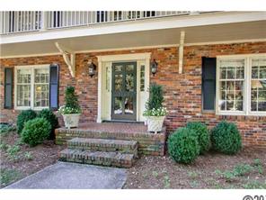 a front view of a house with a porch
