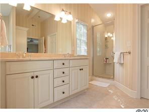 3101 Ferncliff Road Charlotte, NC 28211 - Photo 11 of 16 a bathroom with a double vanity sink mirror and shower