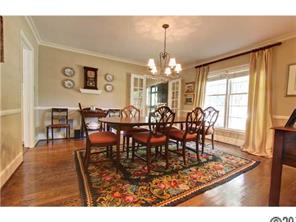 3101 Ferncliff Road Charlotte, NC 28211 - Photo 5 of 16 a view of a dining room with furniture and wooden floor