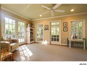 3101 Ferncliff Road Charlotte, NC 28211 - Photo 9 of 16 a living room with furniture and large windows