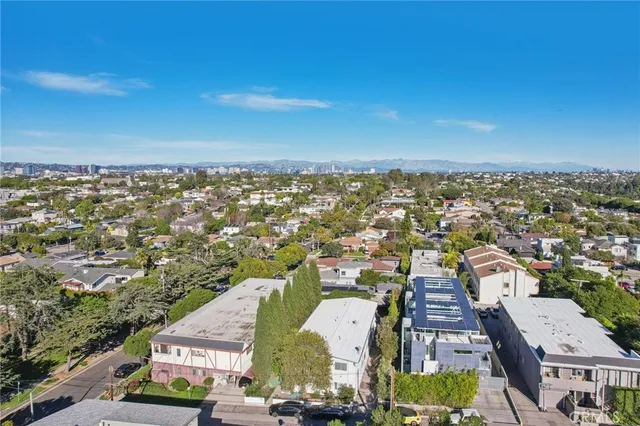 an aerial view of a city with lots of residential buildings