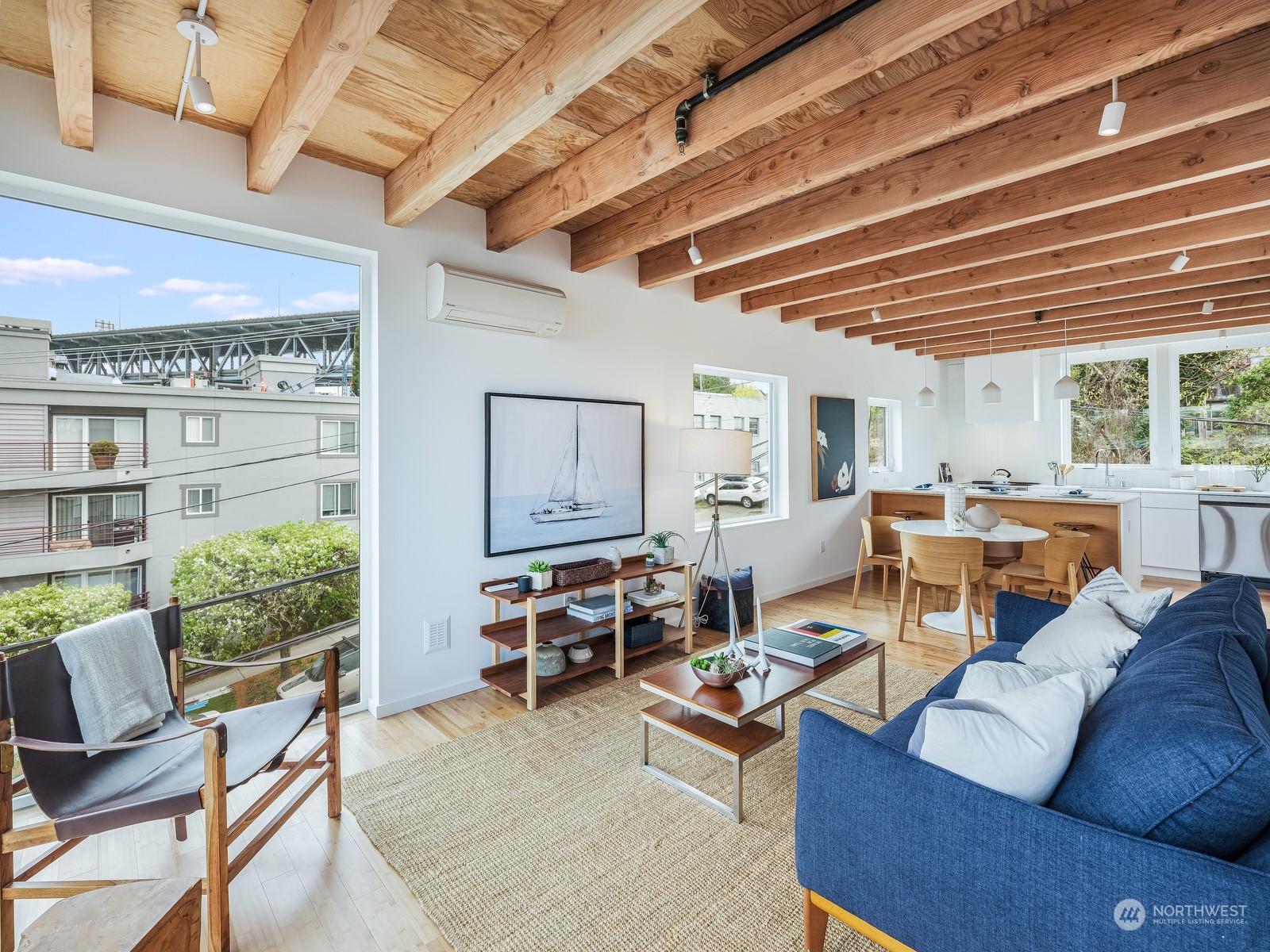 117 East Allison Street Seattle, WA 98102 - Photo 15 of 38 a living room with furniture and a large window