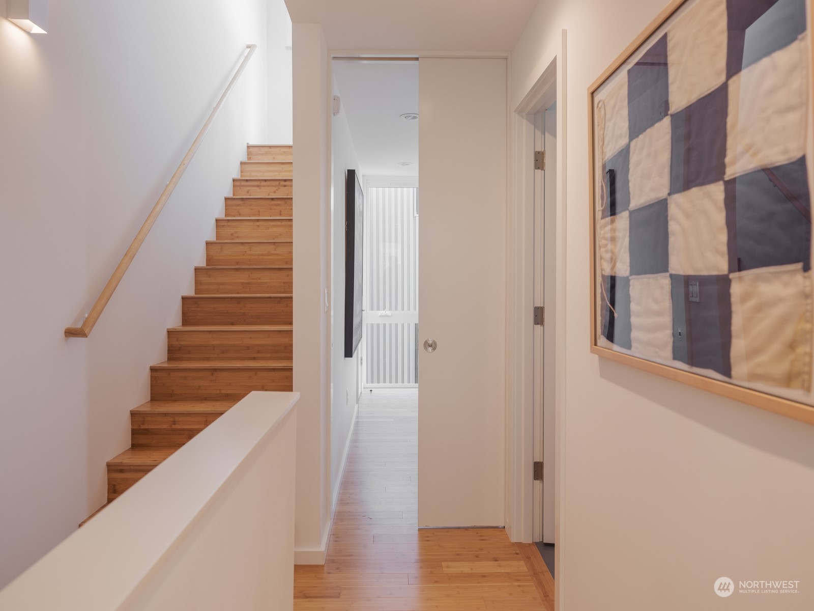 117 East Allison Street Seattle, WA 98102 - Photo 18 of 38 a view of a hallway with wooden floor and entryway