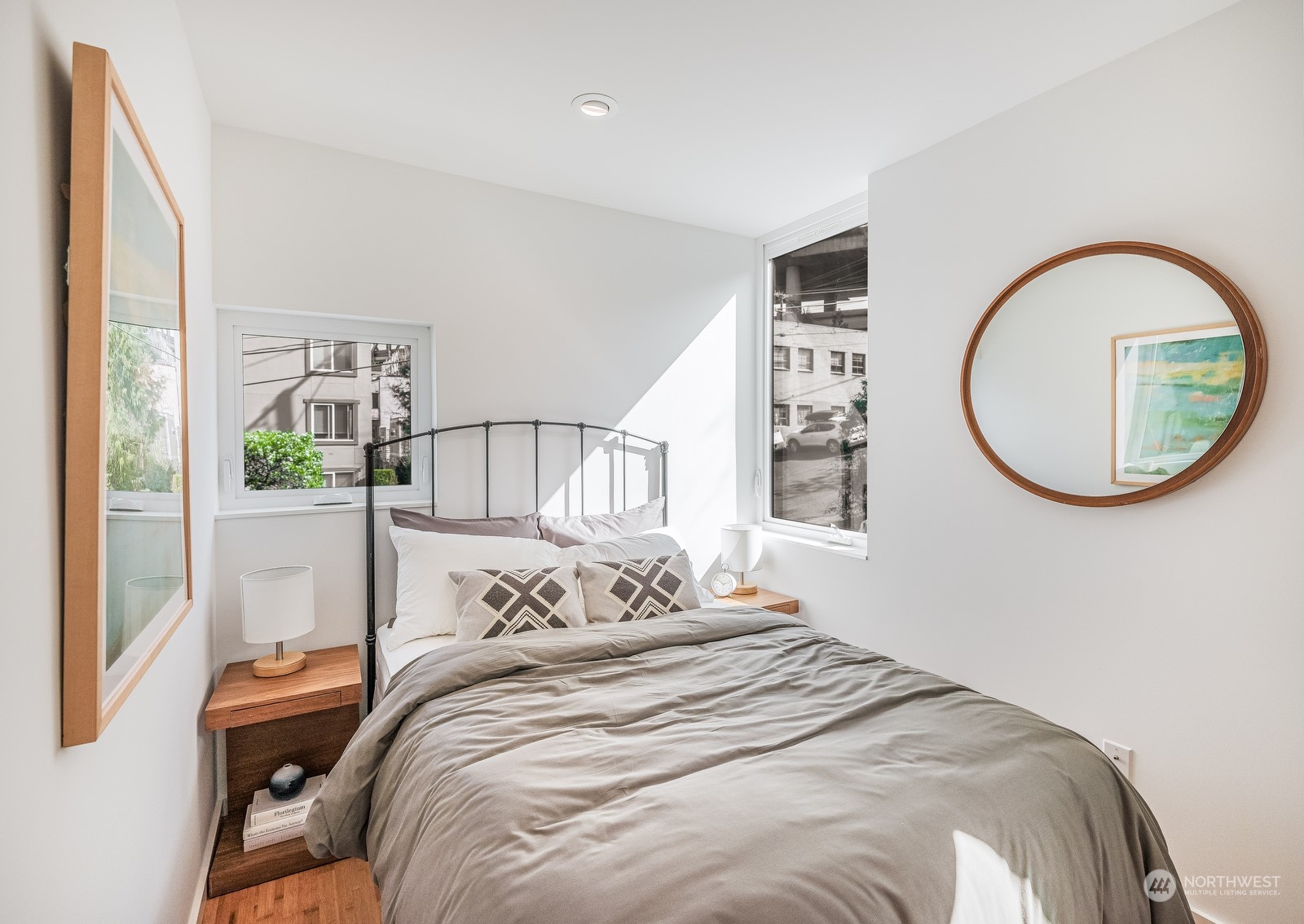 117 East Allison Street Seattle, WA 98102 - Photo 22 of 38 a bedroom with a large bed and a large window