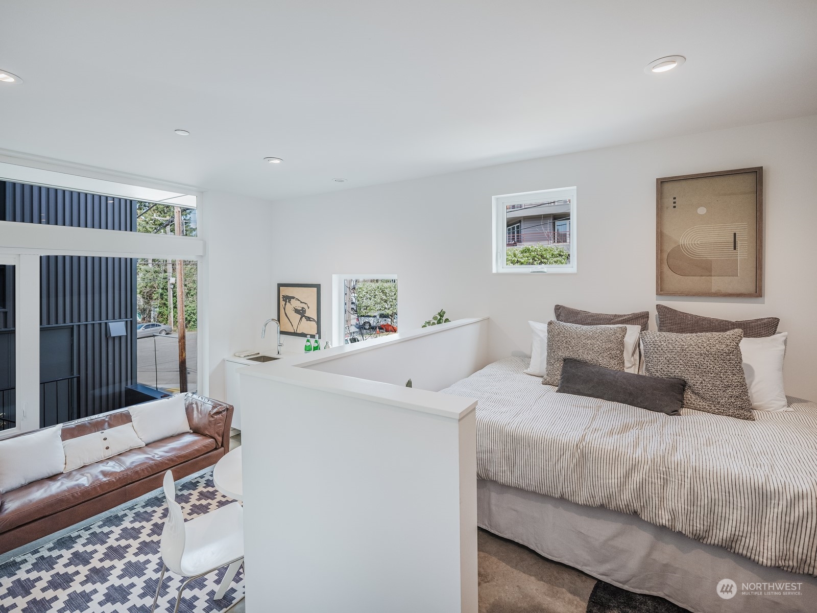 117 East Allison Street Seattle, WA 98102 - Photo 25 of 38 a bedroom with a bed and a window