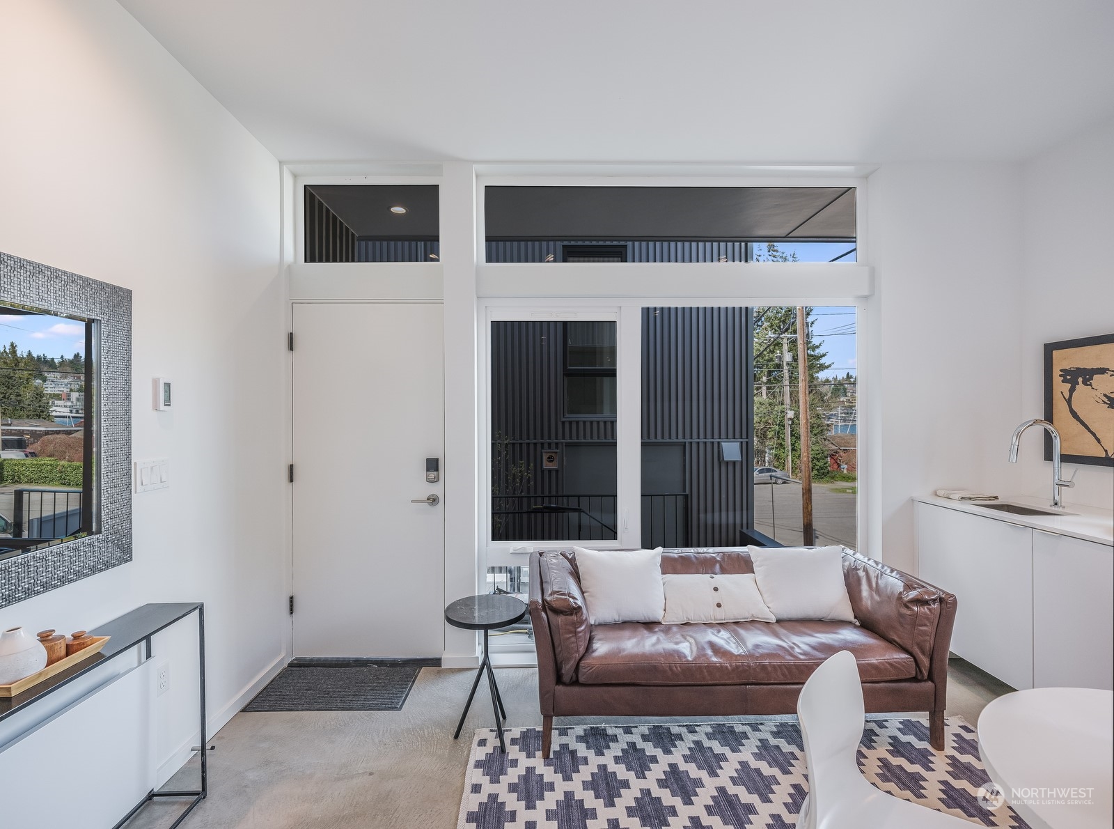 117 East Allison Street Seattle, WA 98102 - Photo 26 of 38 a living room with furniture and a window