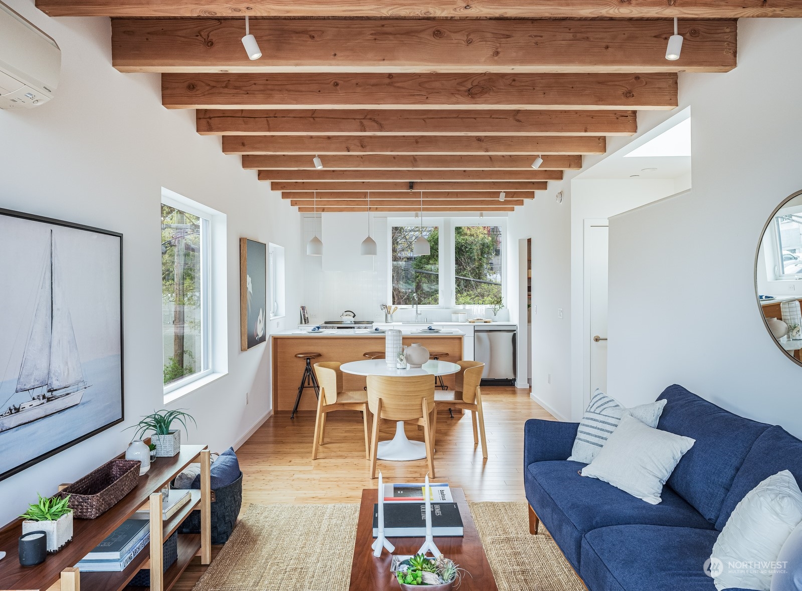117 East Allison Street Seattle, WA 98102 - Photo 3 of 38 a living room with furniture and a wooden floor