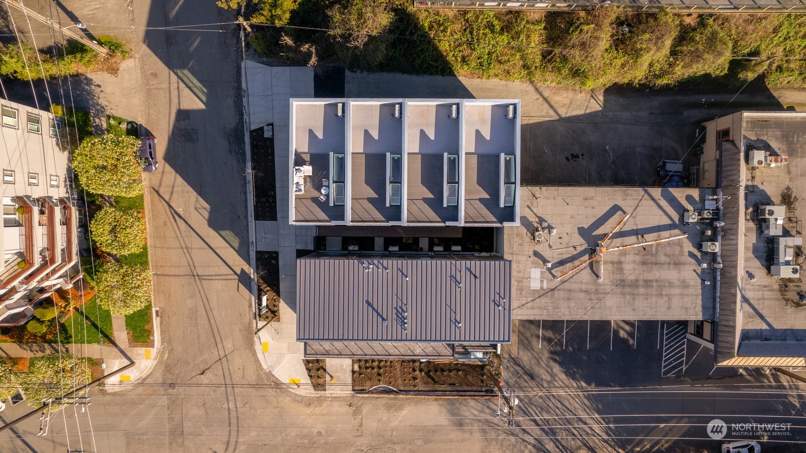 117 East Allison Street Seattle, WA 98102 - Photo 36 of 38 a view of a house with a small yard and wooden fence