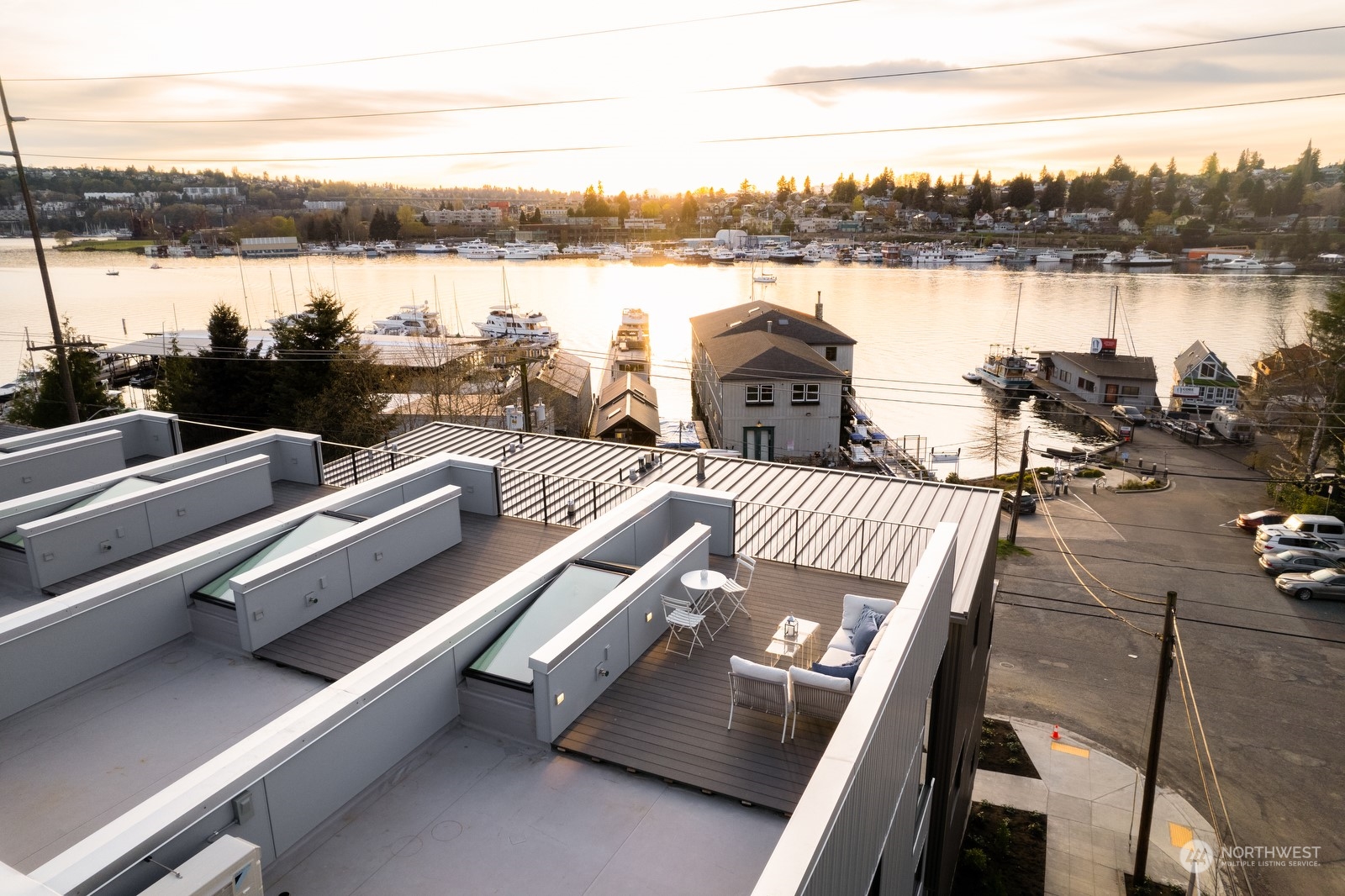 117 East Allison Street Seattle, WA 98102 - Photo 37 of 38 a view of a balcony with lake view and houses in the background