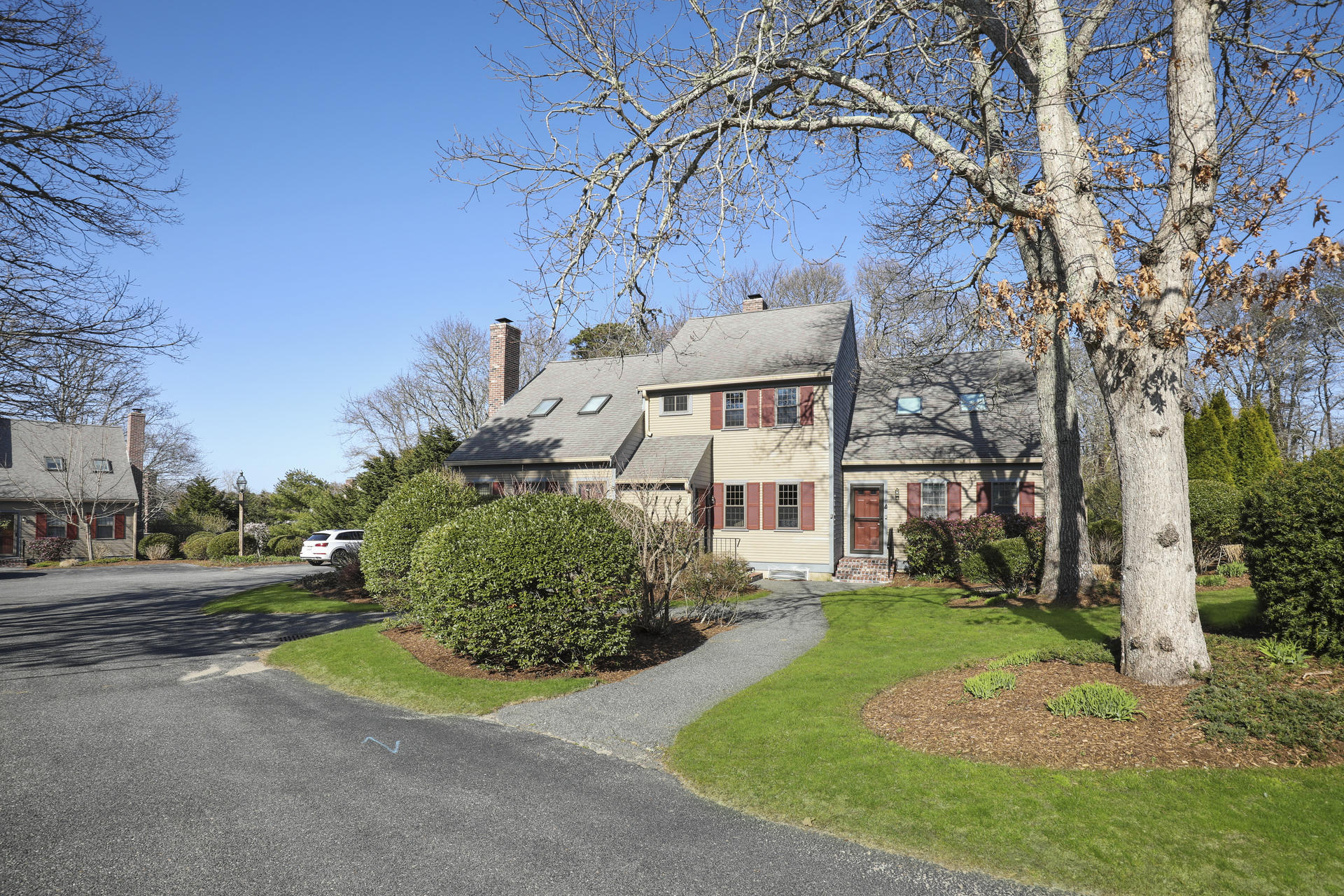front view of a house with a yard