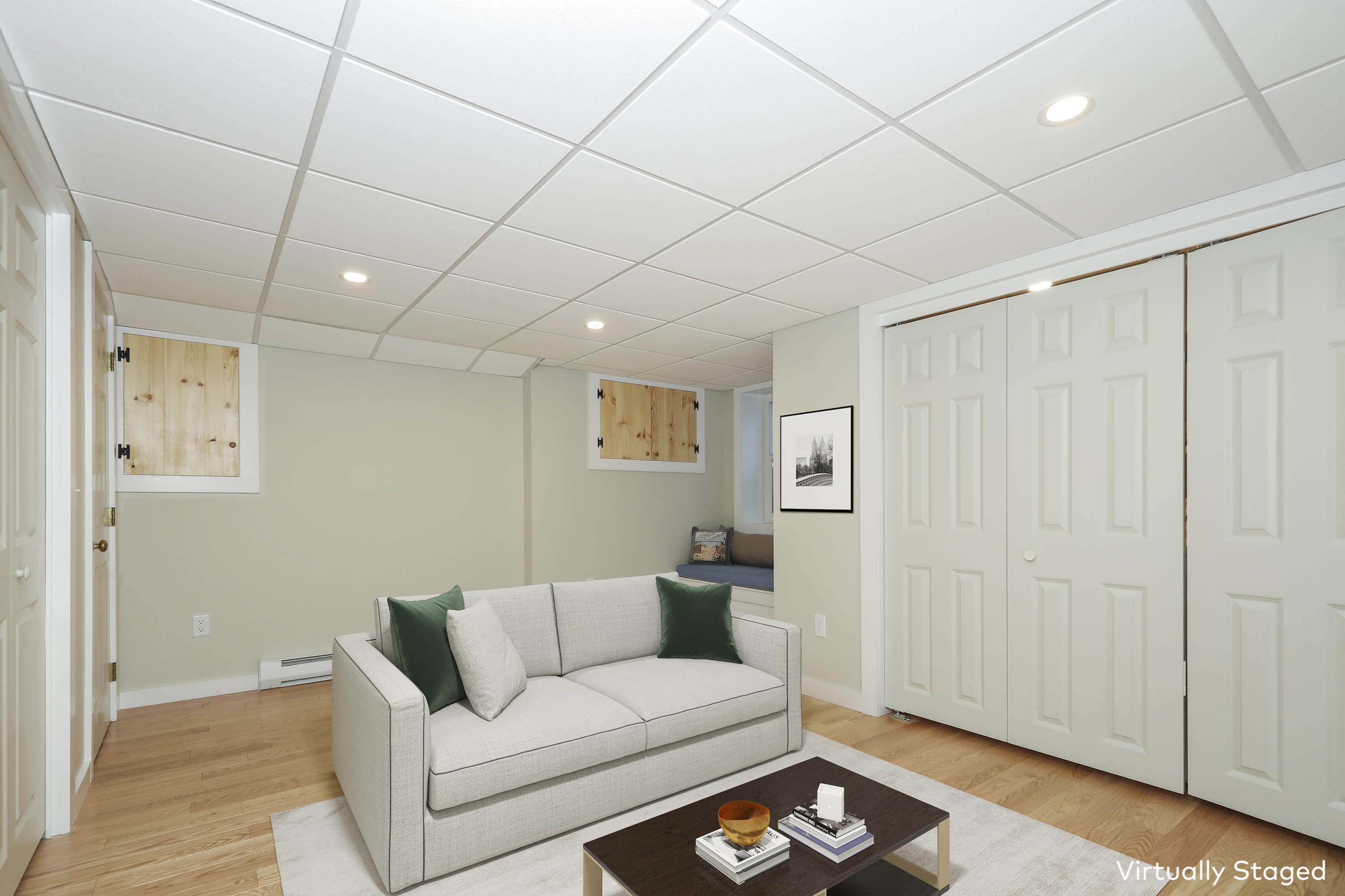 33 West Road, Unit 7B Orleans, MA 02653 - Photo 19 of 24 a living room with furniture and a wooden floor