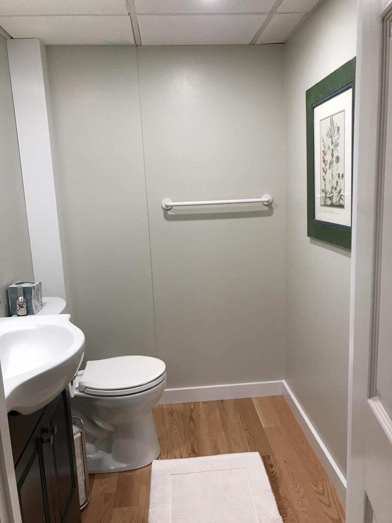 33 West Road, Unit 7B Orleans, MA 02653 - Photo 20 of 24 a bathroom with a sink and a toilet