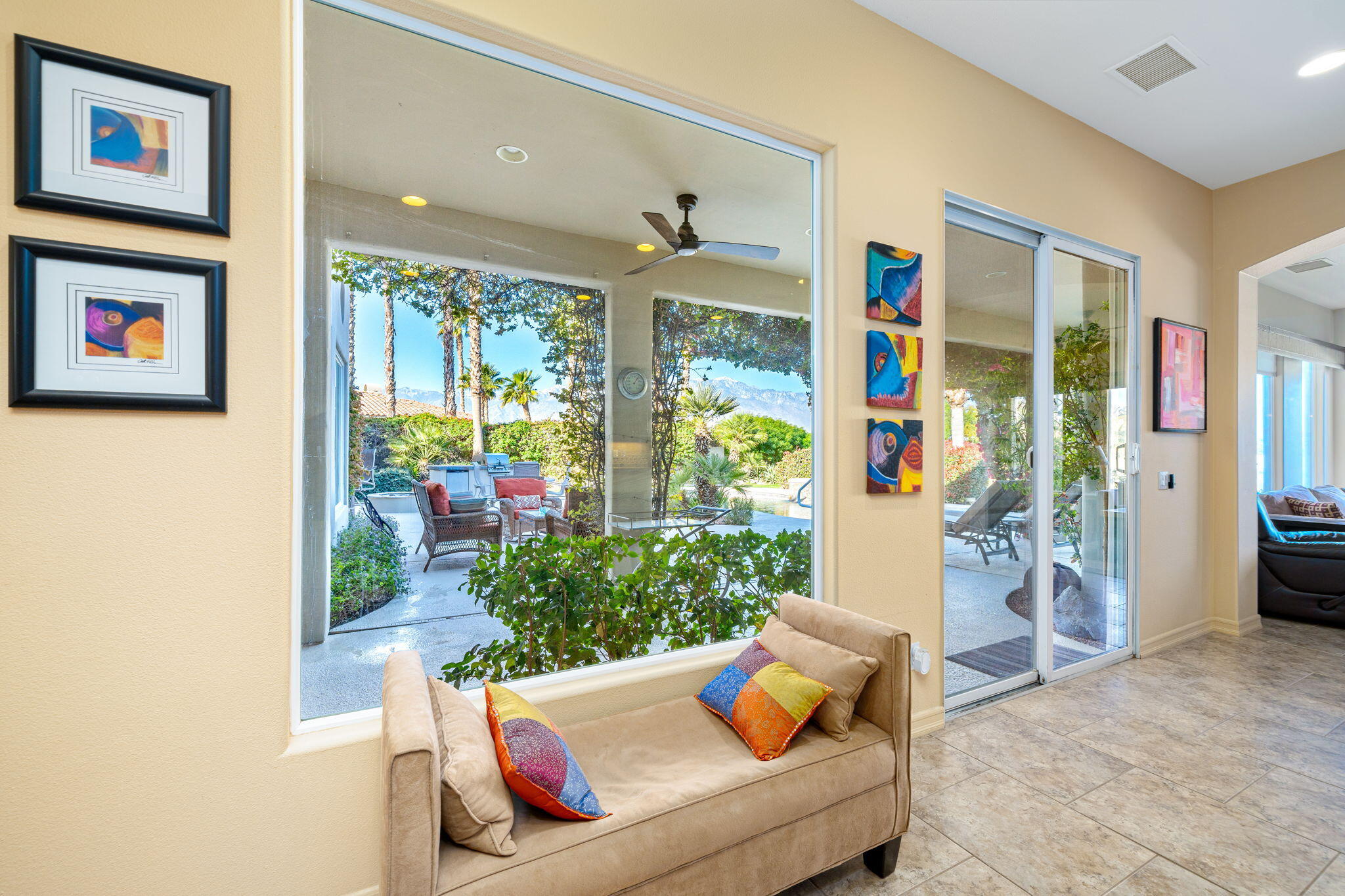 325 Loch Lomond Road Rancho Mirage, CA 92270 - Photo 20 of 49 a living room with furniture and a large window