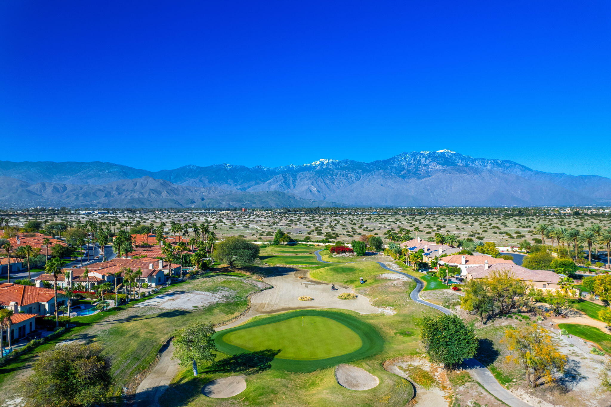 325 Loch Lomond Road Rancho Mirage, CA 92270 - Photo 6 of 49 a view of a city with mountains in the background