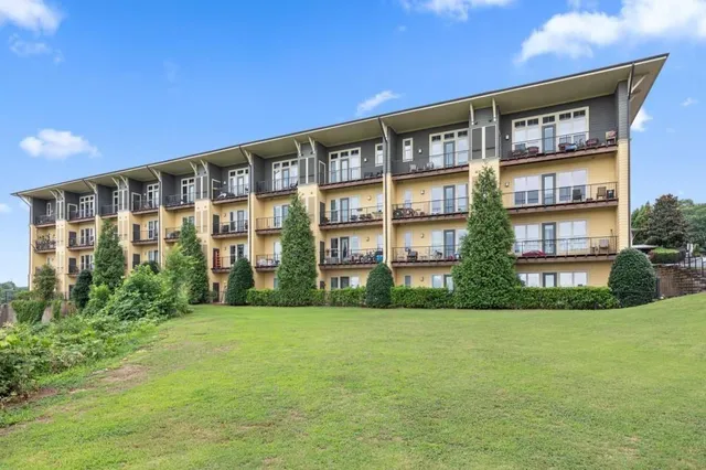 a front view of building with yard