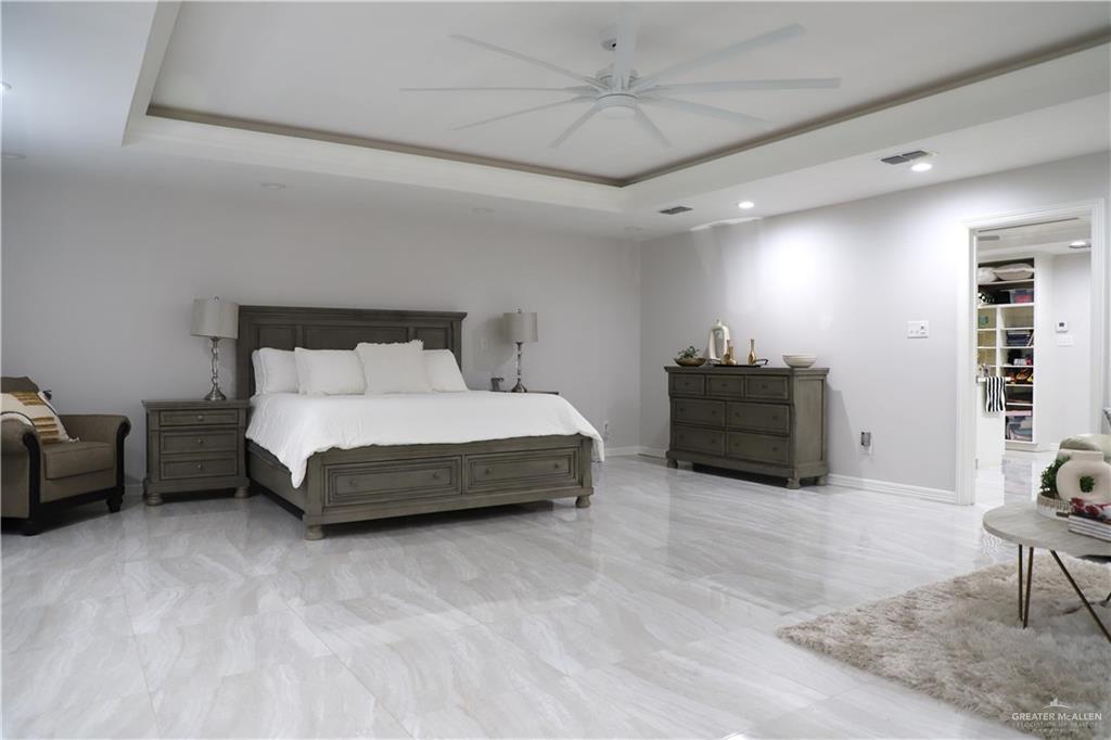 12431 Ware Road Edinburg, TX 78541 - Photo 17 of 37 a bedroom with bed and window