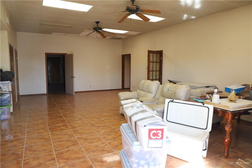 12431 Ware Road Edinburg, TX 78541 - Photo 24 of 37 a utility room with multiple dryer and washer