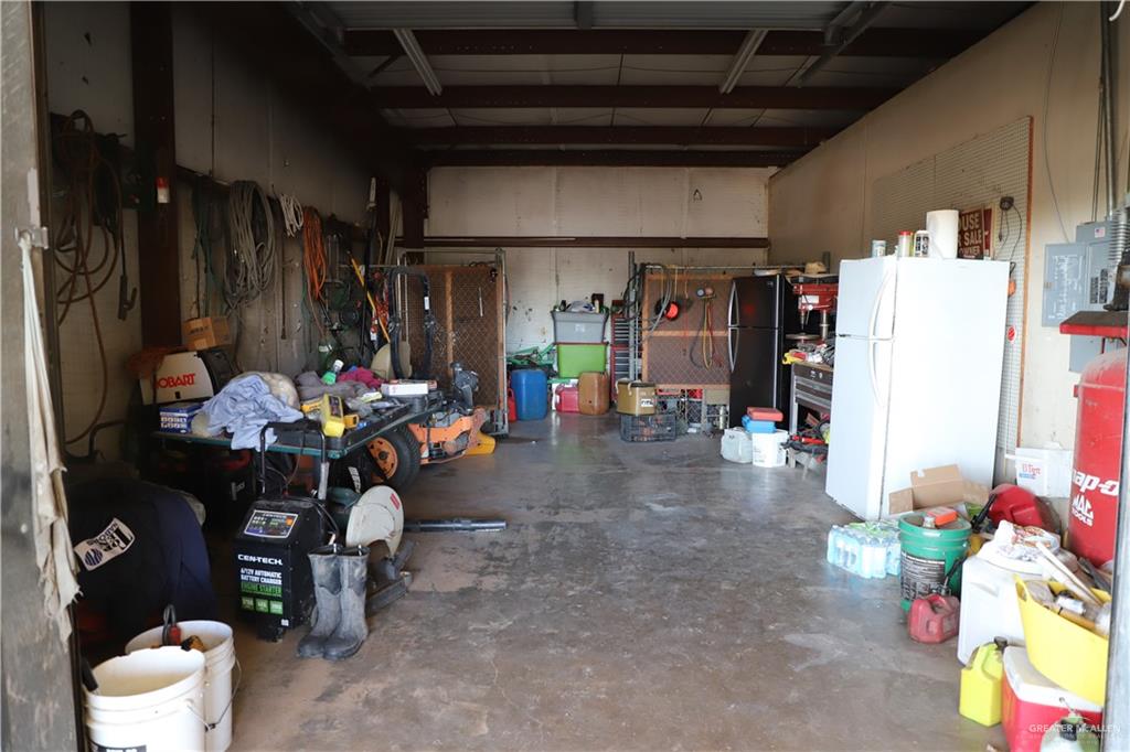 12431 Ware Road Edinburg, TX 78541 - Photo 29 of 37 a view of a room with storage and utility room