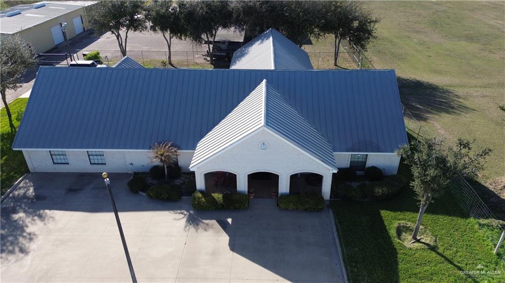 12431 Ware Road Edinburg, TX 78541 - Photo 3 of 37 a view of a house with backyard and sitting area