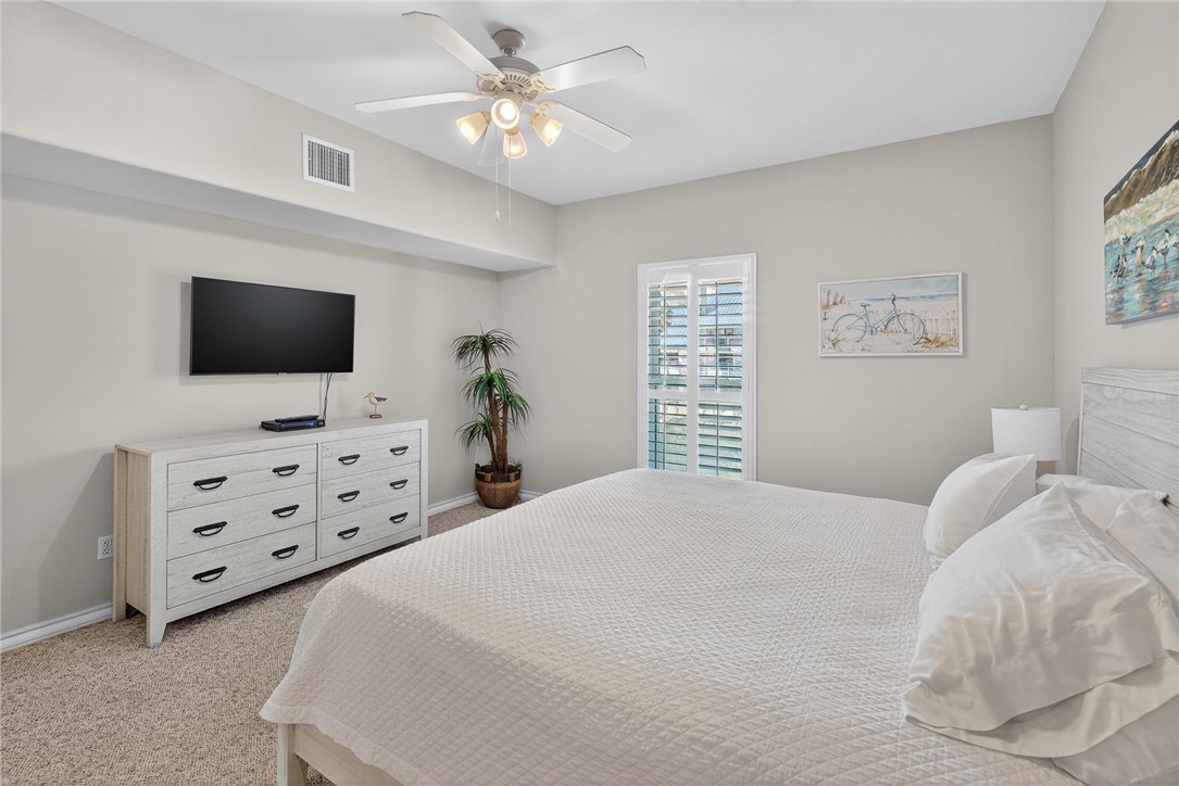 14427 Compass Street, Unit B12 Corpus Christi, TX 78418 - Photo 19 of 40 Primary bedroom is quite spacious and includes a K