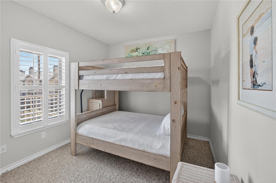 14427 Compass Street, Unit B12 Corpus Christi, TX 78418 - Photo 4 of 40 Charming full sized bunk beds come with unit