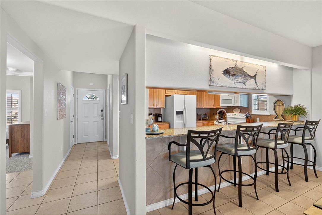 14427 Compass Street, Unit B12 Corpus Christi, TX 78418 - Photo 9 of 40 Pull up a stool to eat, visit with the chef or jus