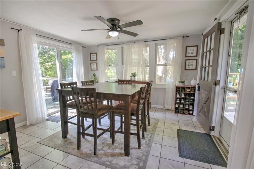 7368 Hopkins Road Mentor, OH 44060 - Photo 14 of 37 Dining room featuring light tile patterned floors and ceiling fan