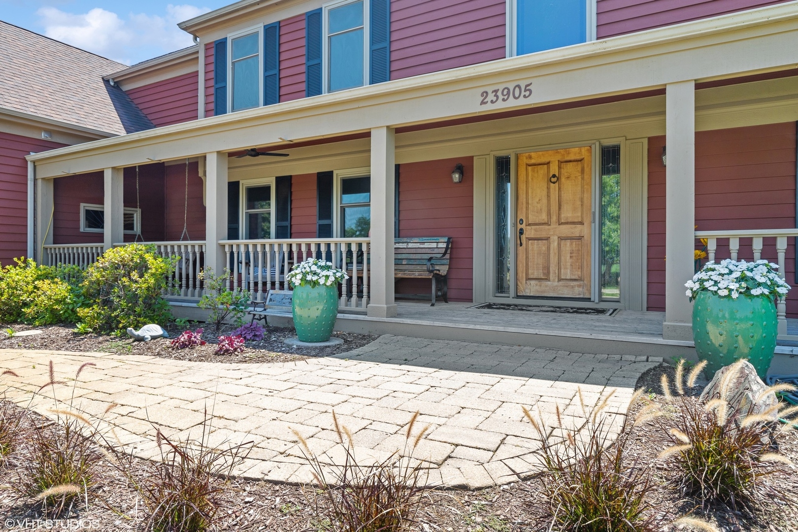 23905 West Bedlington Circle Deer Park, IL 60010 - Photo 2 of 23 front view of a brick house with a small yard